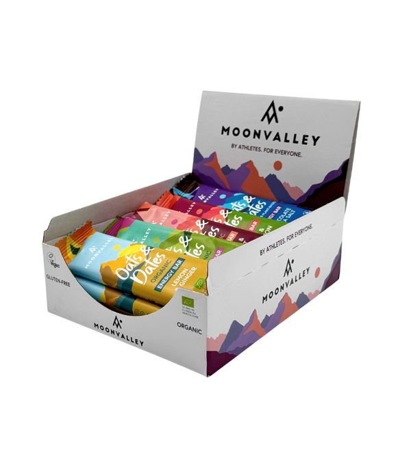 Moonvalley Bio Energieriegel Mix Displaybox mit veganen und glutenfreien Hafer- und Dattelriegeln in verschiedenen Geschmacksrichtungen.